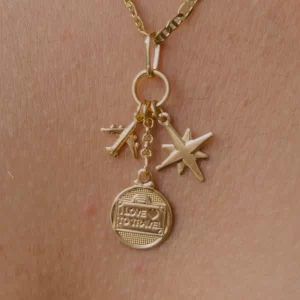 Dije Viajero 18K