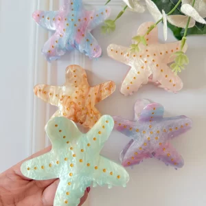 Pinza estrella nácar